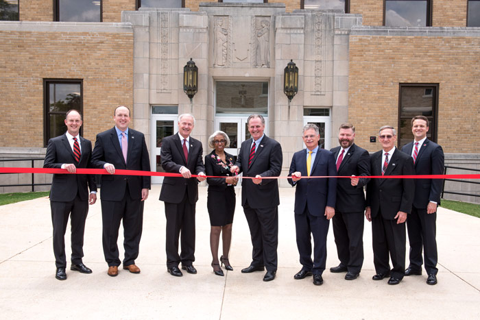 Officials cut the ribbon at the Wilson Hall Rededication Ceremony