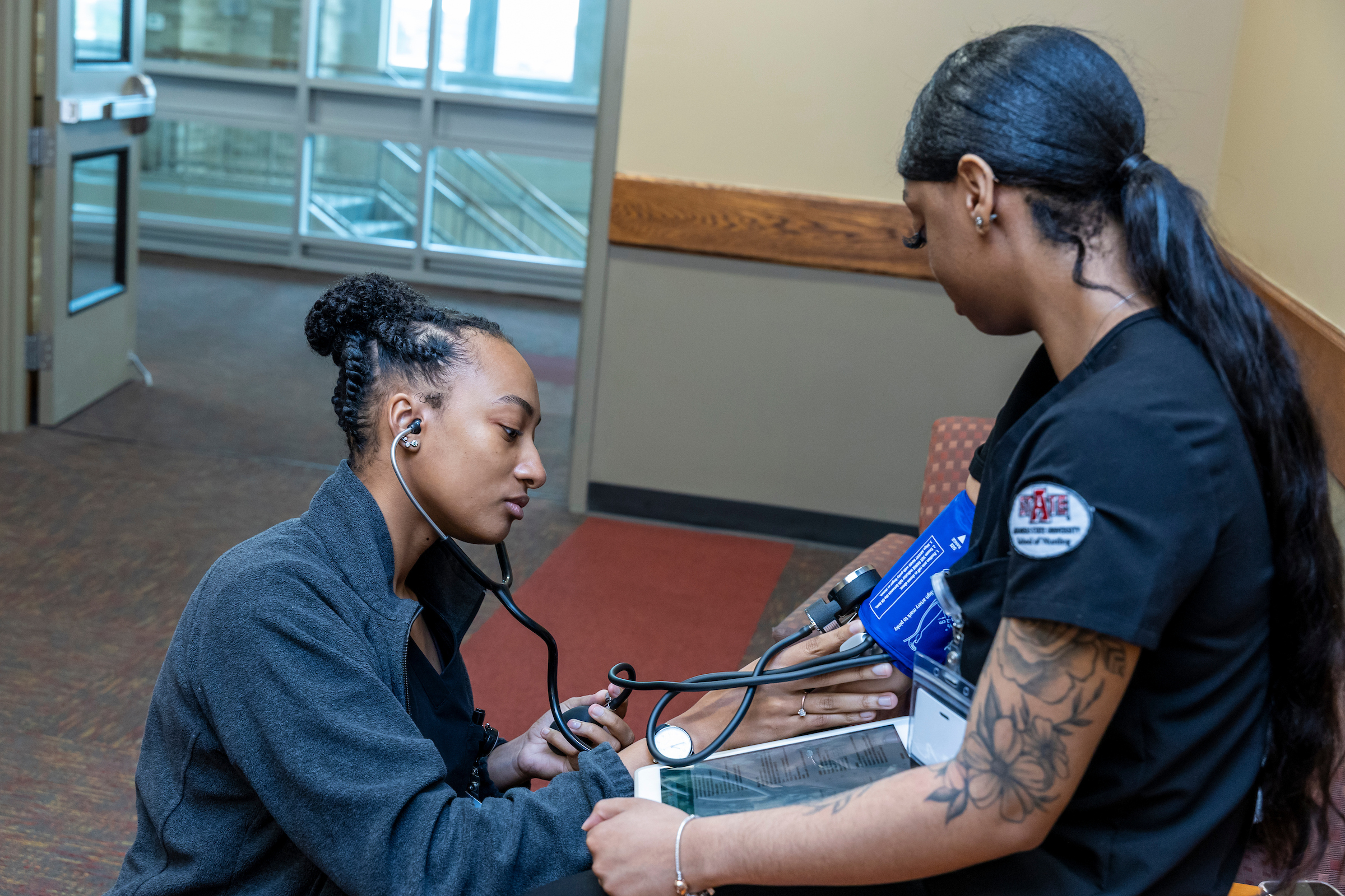 Students taking vitals.