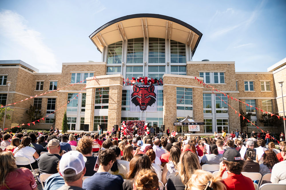 Dr. Todd Shields welcomes a record crowd at the Pack Preview event on Oct. 21, 2023.