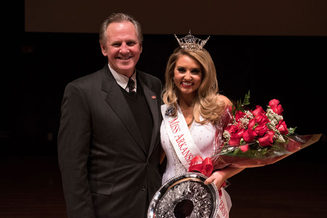 Bailey Moses, Miss Arkansas State University 2016, poses for a photo with Chancellor Tim Hudson following the crowning ceremony.