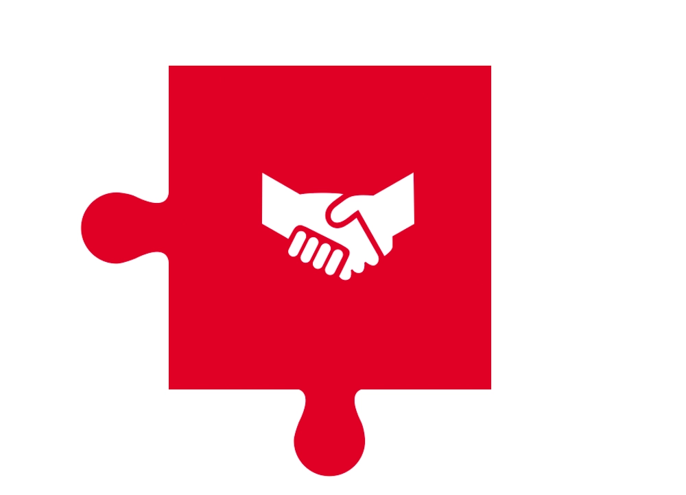 A red puzzle piece with two people shaking hands in the center.