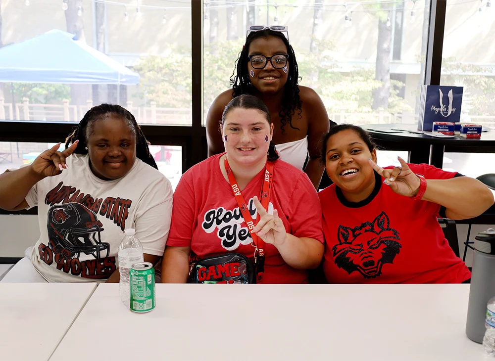 H.O.W.L students and staff pose for a photo.